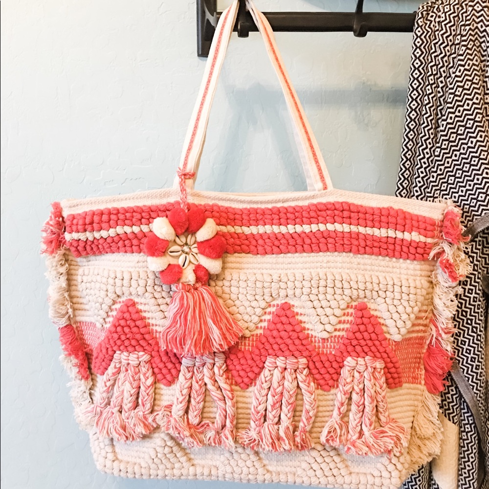 The SKYE Woven Tapestry Weekender Handbag in Coral